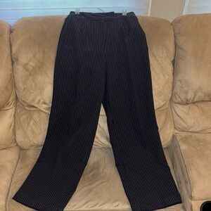 Black dress pants size 4 by the brand Wrapper